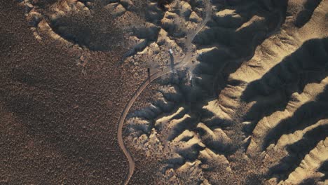 Bird's-Eye-View-Of-Van-Camping-In-The-Desert,-South-Of-Salt-Lake-City,-Utah,-USA---Drone-Shot