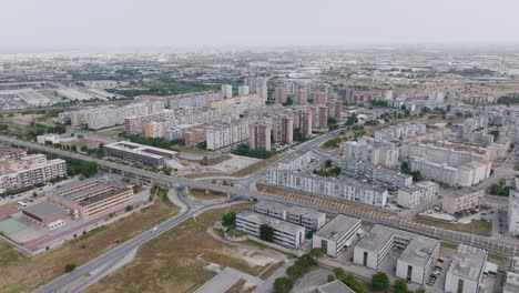 Slow-wide-aerial-of-apartment-buildings-in-the-suburbs-outside-of-Bari,-Italy