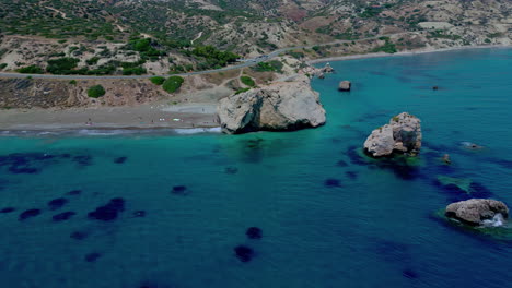 Aphrodite's-Rock-Viewpoint-Beach,-aerial-dynamic