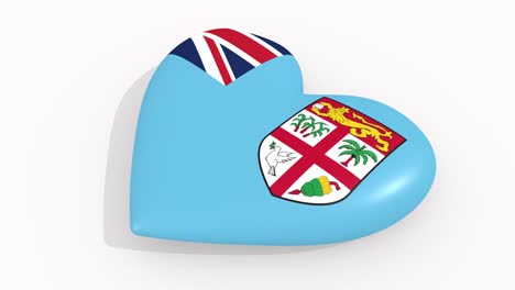corazón con los colores y símbolos de la república de fiji sobre fondo blanco, bucle