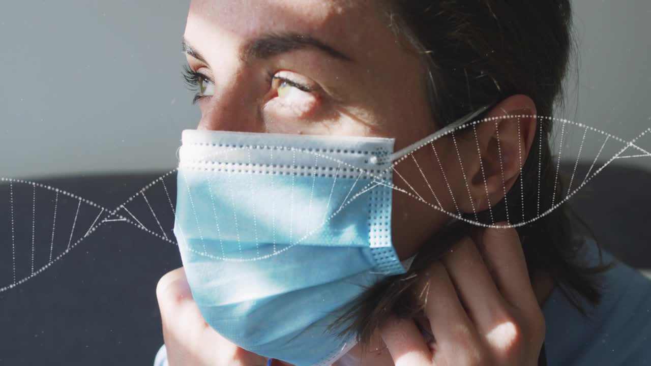 Woman on sofa adjusting blue mask for health as sunlight catching face, animated helix over face