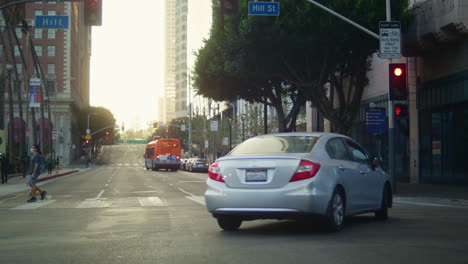 young woman crossing street following traffic rules. asian girl walking road