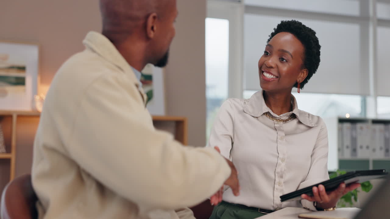 Business meeting with African American professionals in the office