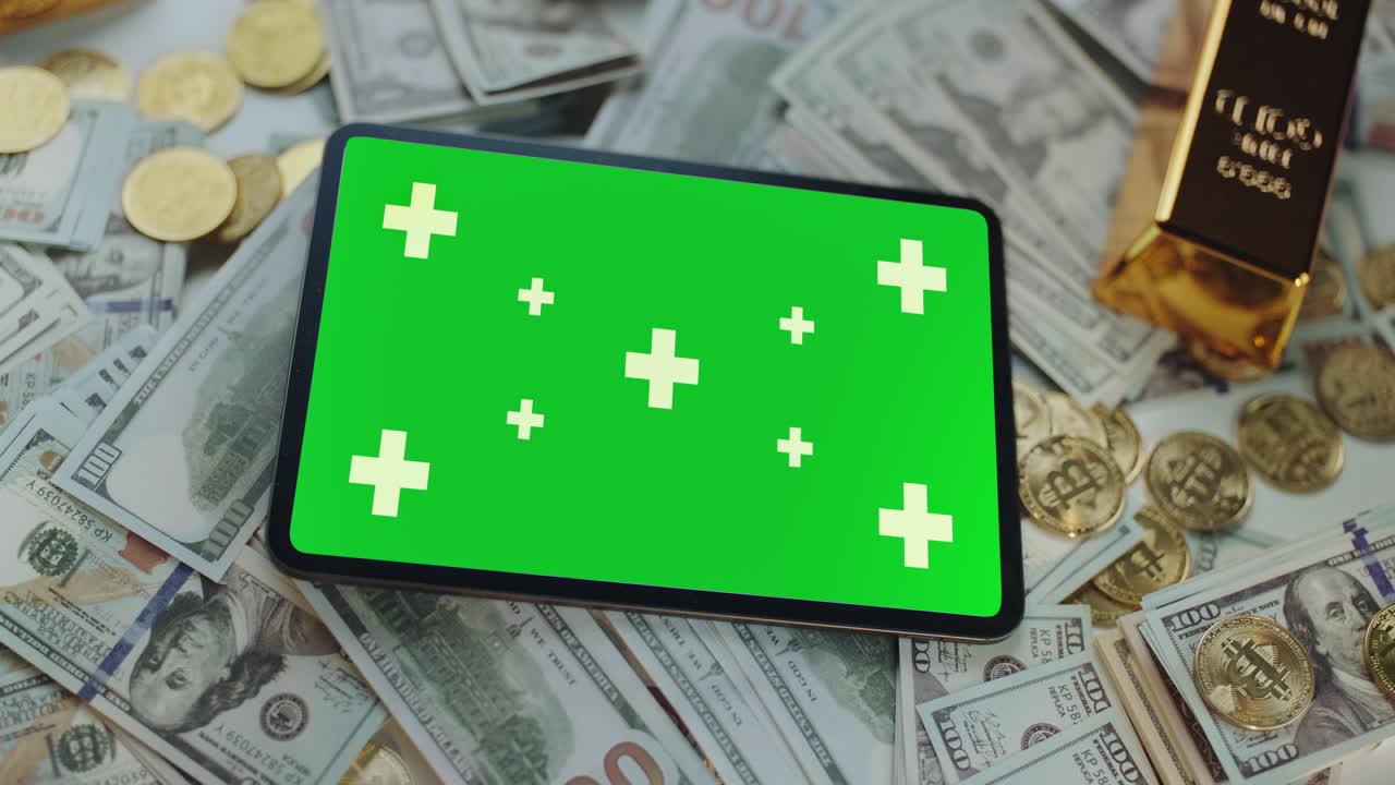 Money and Gold with Tablet Green Screen