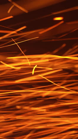 grinder sparks flying pattern. grinding glitter manufacturing. vertical video