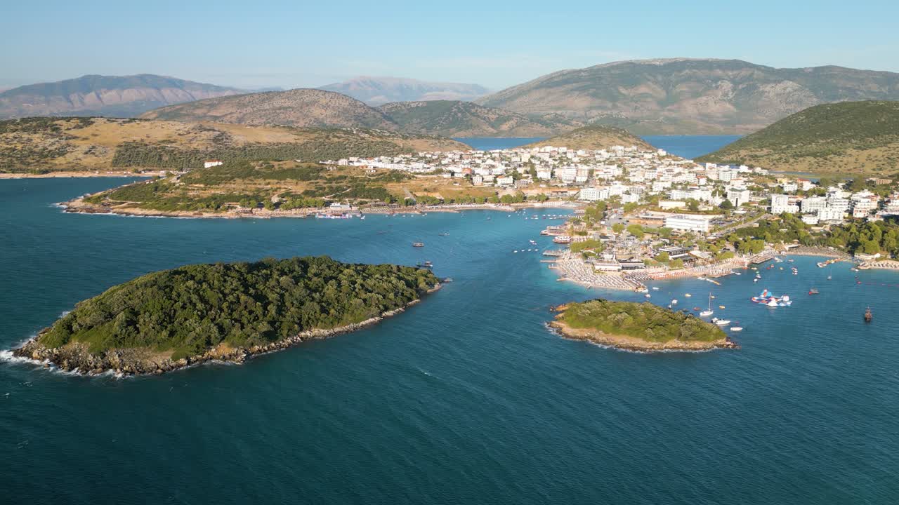 Aerial drone panning shot for the coast of Ksamil at the Albanian Riviera