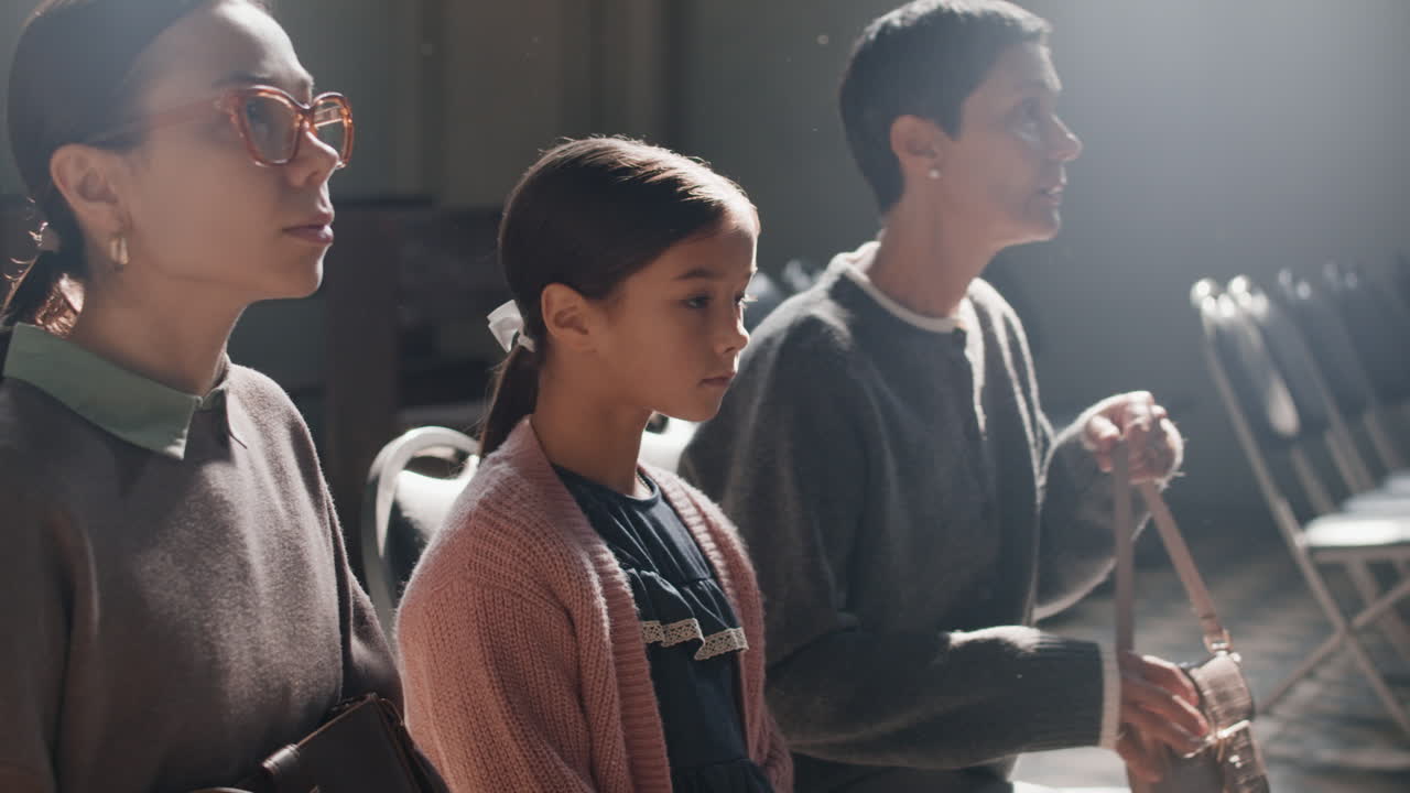 People sitting on church pews