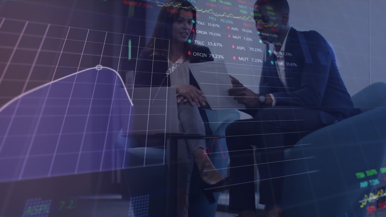 Animation of data processing over diverse businessman and businesswoman discussing at office