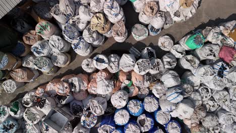 Bags-Full-of-Toxic-Waste,-Global-e-Waste-Dumping-Management-of-Electronic-Waste,-Illegal-Shipping-of-e-Waste,-Processing-Recycling-and-Environmental-Impact