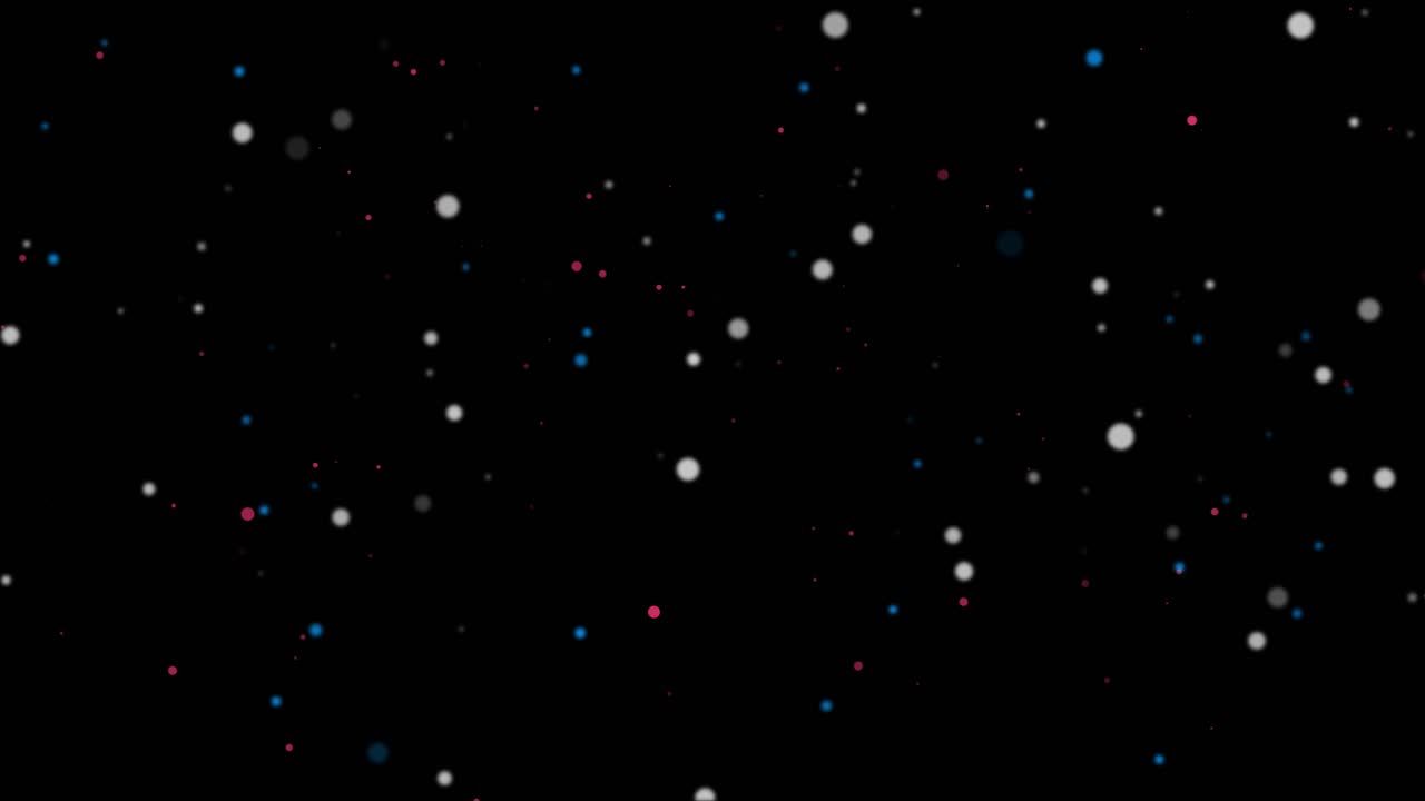 Particelle colorate astratte fluttuanti su sfondo nero