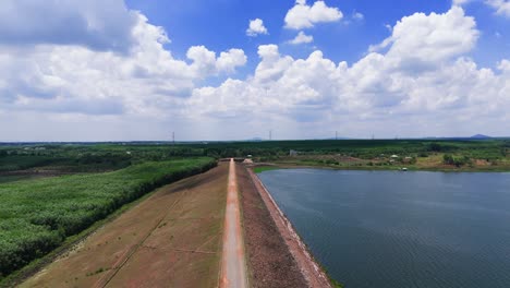 aerial view dolly of the dam and the lake in dong nai.