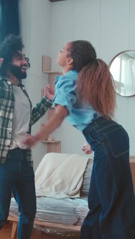 young energetic friends woman and man dance celebrating moving