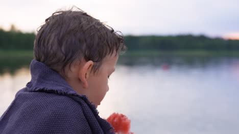 kid eating watermelon