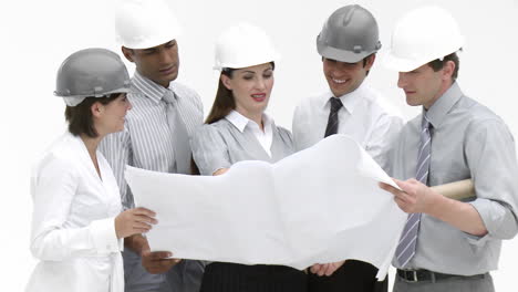 construction workers looking at a drawing