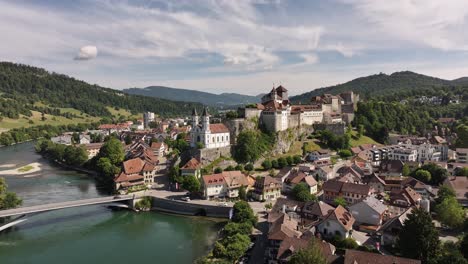 aerial view of aarburg castle and church by the aare river in solothurn, switzerland