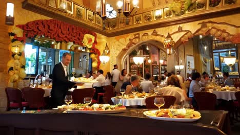 people enjoying a meal at a restaurant