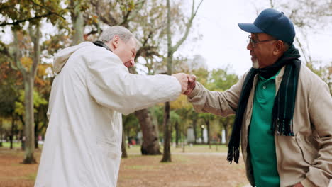 Senior-men,-fist-bump-and-forest-hiking