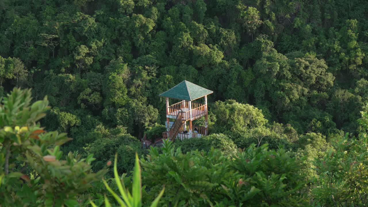 Secluded viewpoint above dense forest of Cat Ba national park, Vietnam