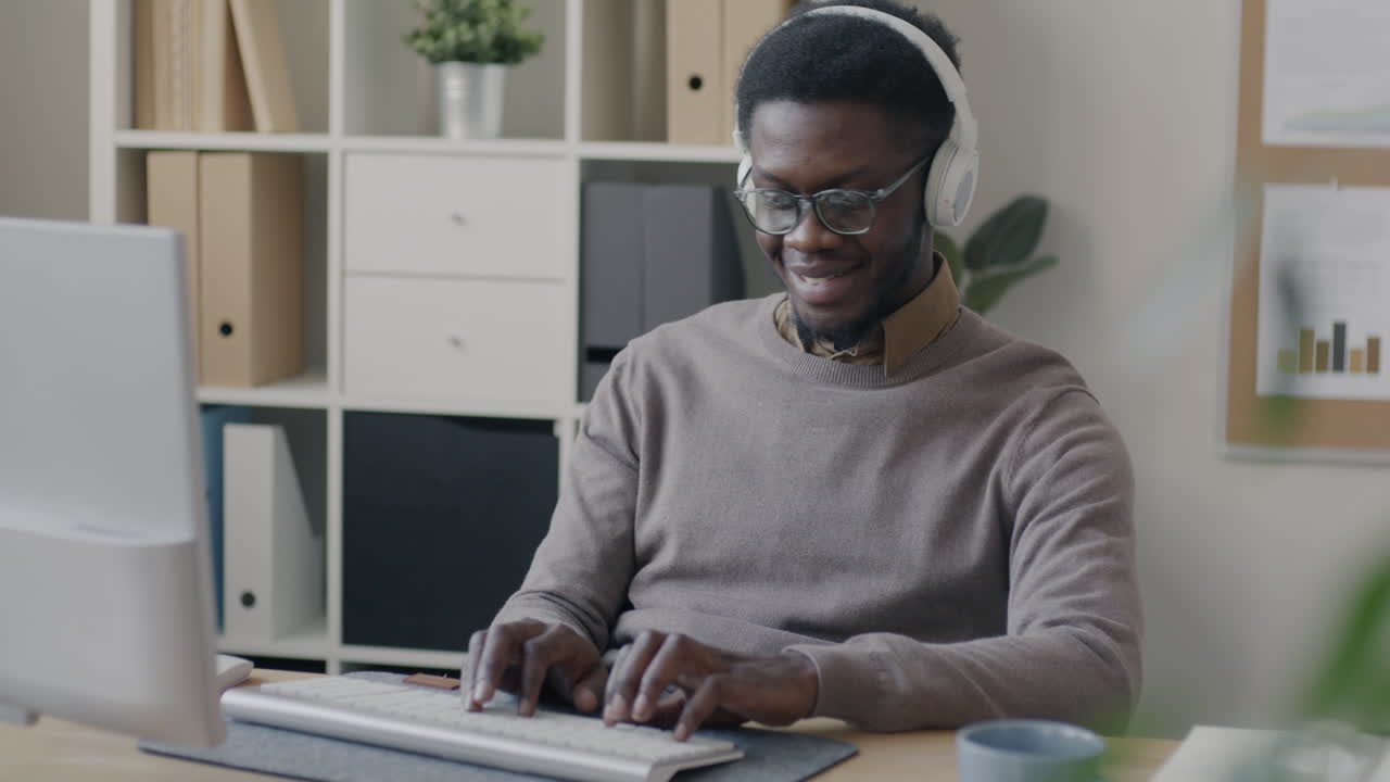 Man working on a computer in an office