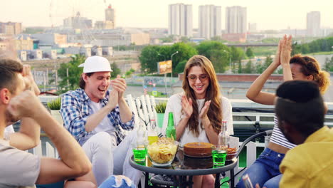 friends celebrating birthday rooftop party