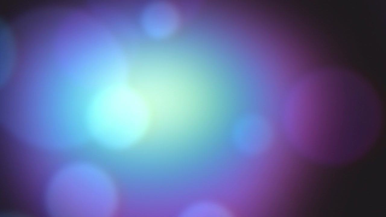 Abstract Background with Soft Glowing Blue and Purple Bokeh Lights