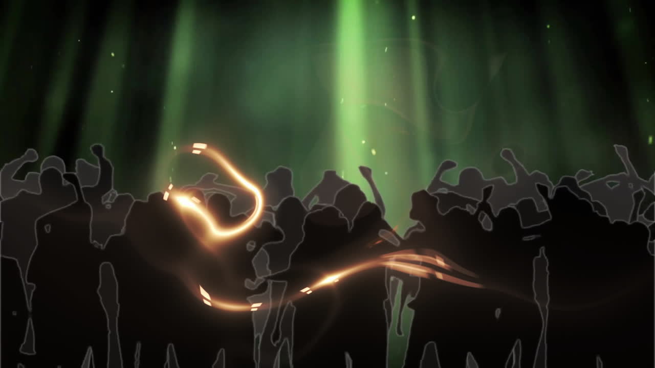 Silhouetted crowd dancing under green light beams with glowing particles and golden light swirl
