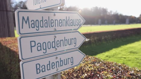 directional signs at nymphenburg castle - munich, germany