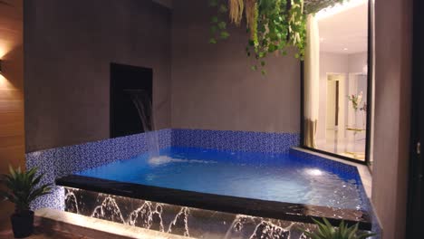 relaxing jacuzzi with waterfall, jeddah, saudi arabia , zoom out shot