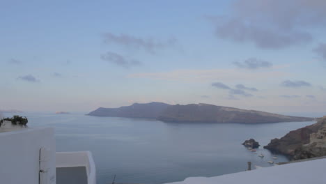 tracking shot of the majestic caldera view in oia, santorini