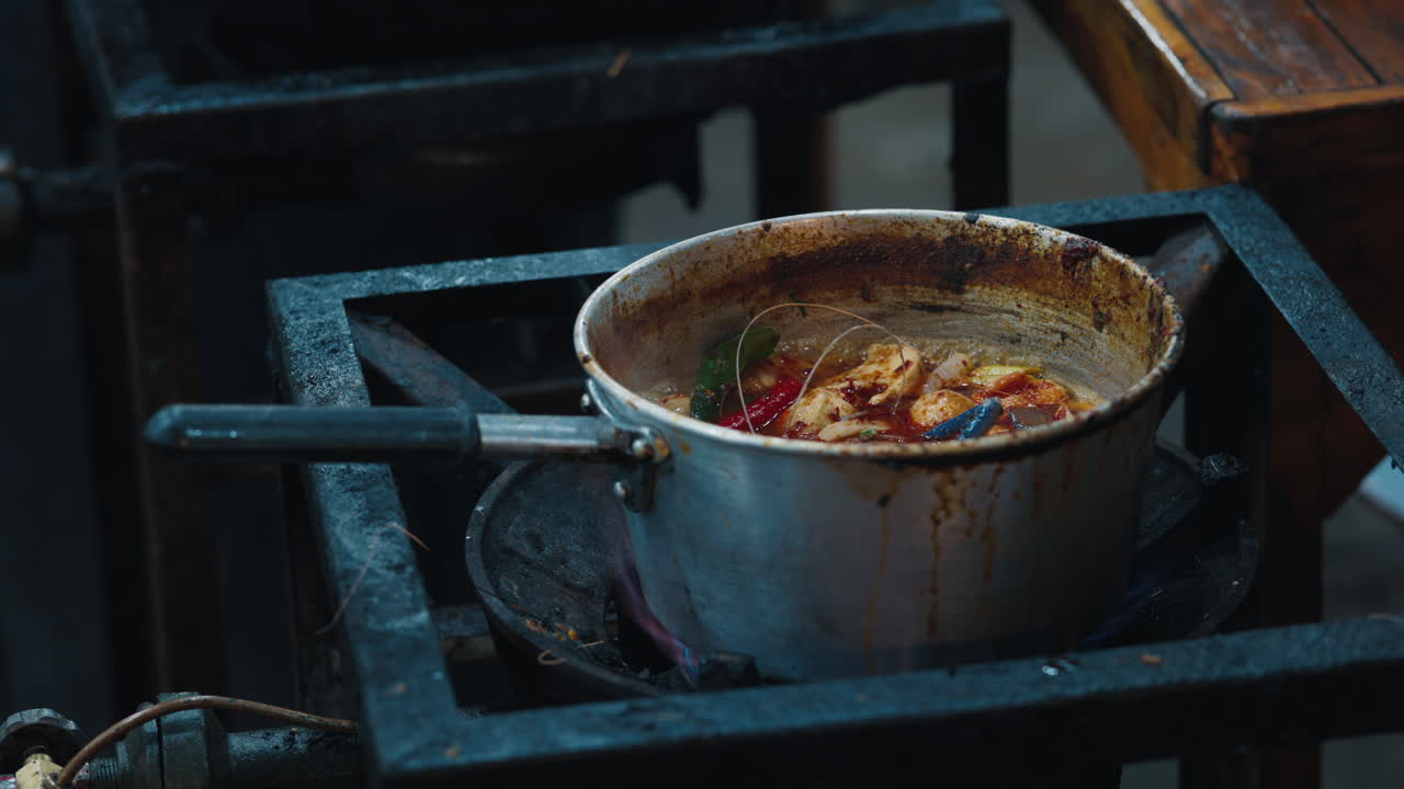 Thai Shrimp Soup Cooking on a Street Vendor's Stove
