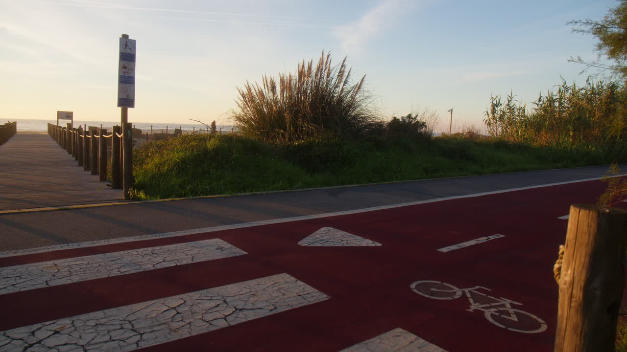 Bicycle path in the coast of Vila Nova de Gaia, Portugal. Sunset
