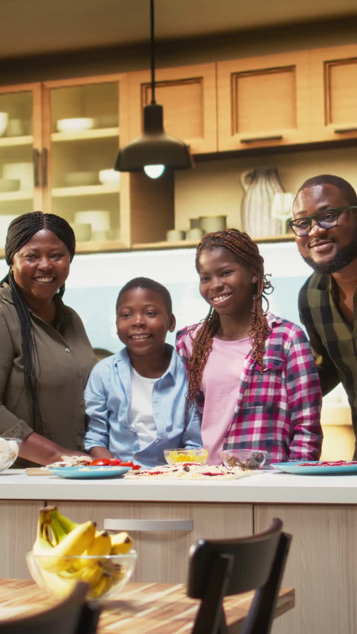 Vertical Video Portrait of african american family laughing and enjoying time together