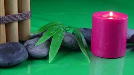 red candle leaf and bamboo invoking tranquility