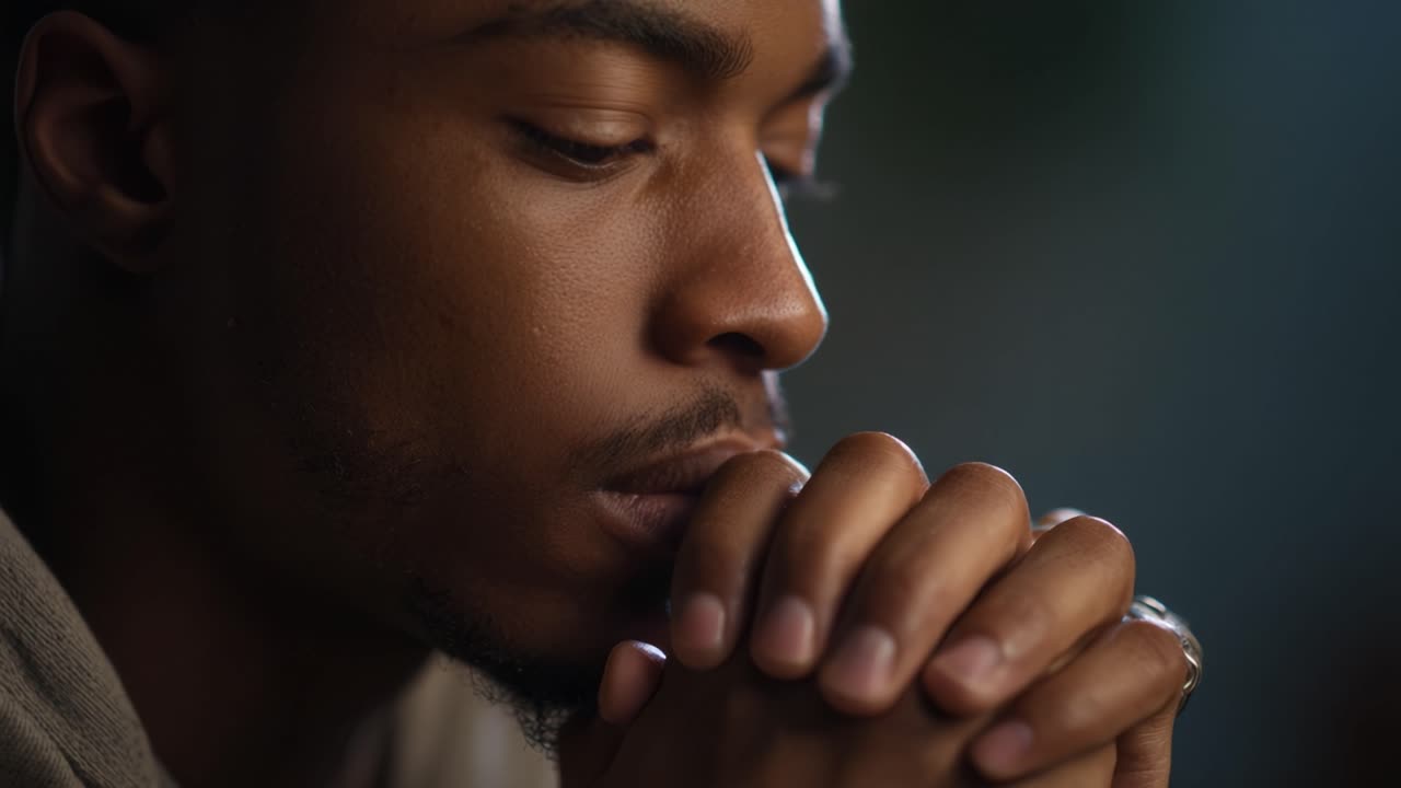 A Contemplative Moment: A Deep Reflection Featuring a Young Man Lost in Thought with Focused Expression and Thoughtful Posture