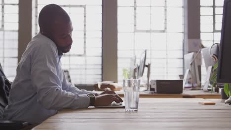 young creative professional working in a modern office