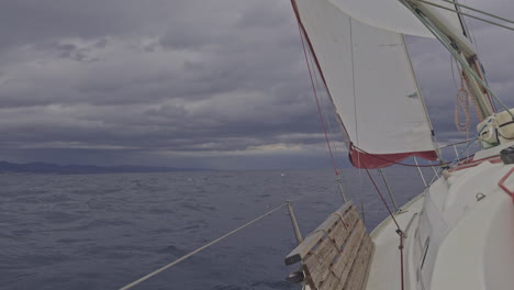 sailing boat in the mediterranean off the coast of barcelona