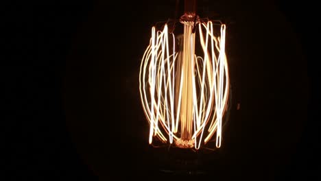 retro industrial incandescent light lamp tungsten filament in the dark-5