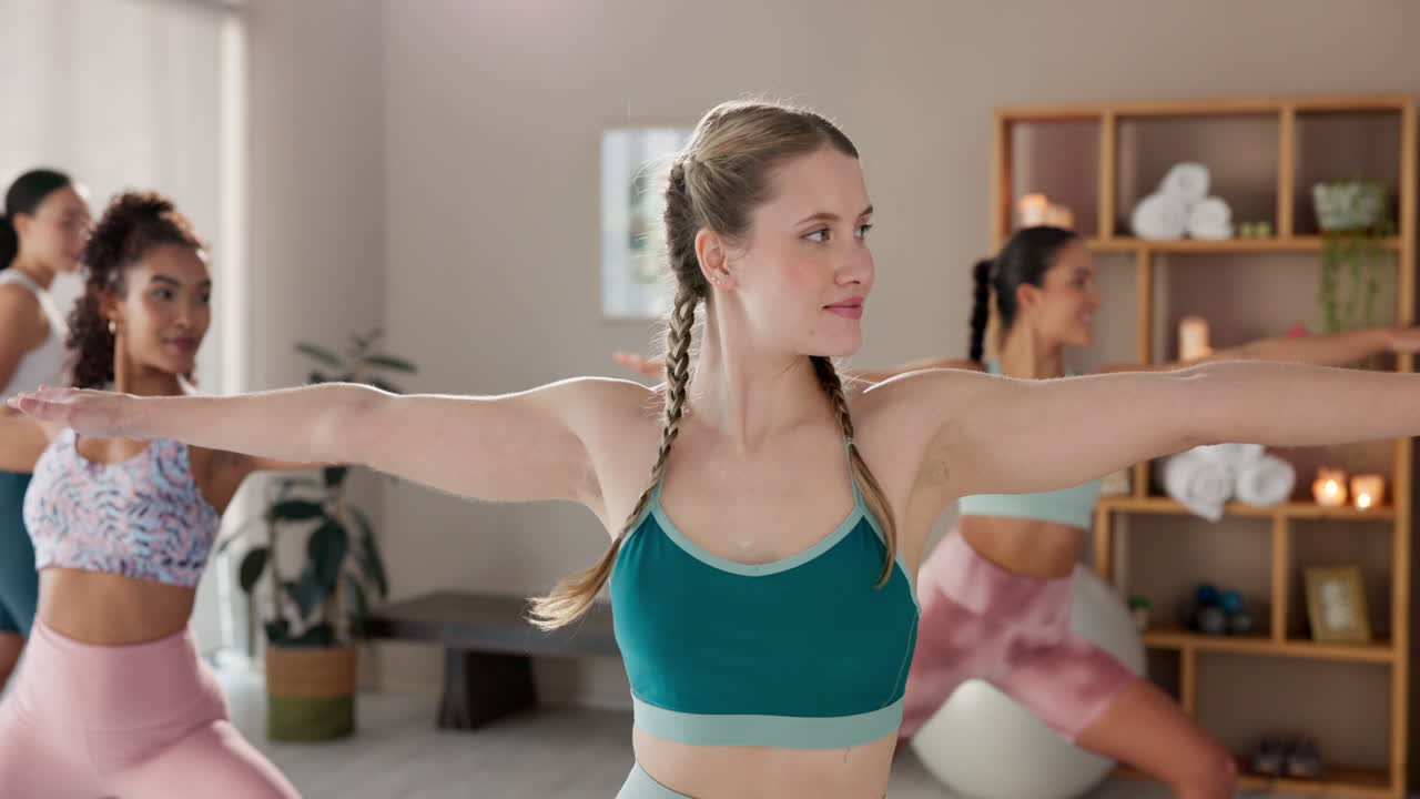 Yoga class with women in warrior pose