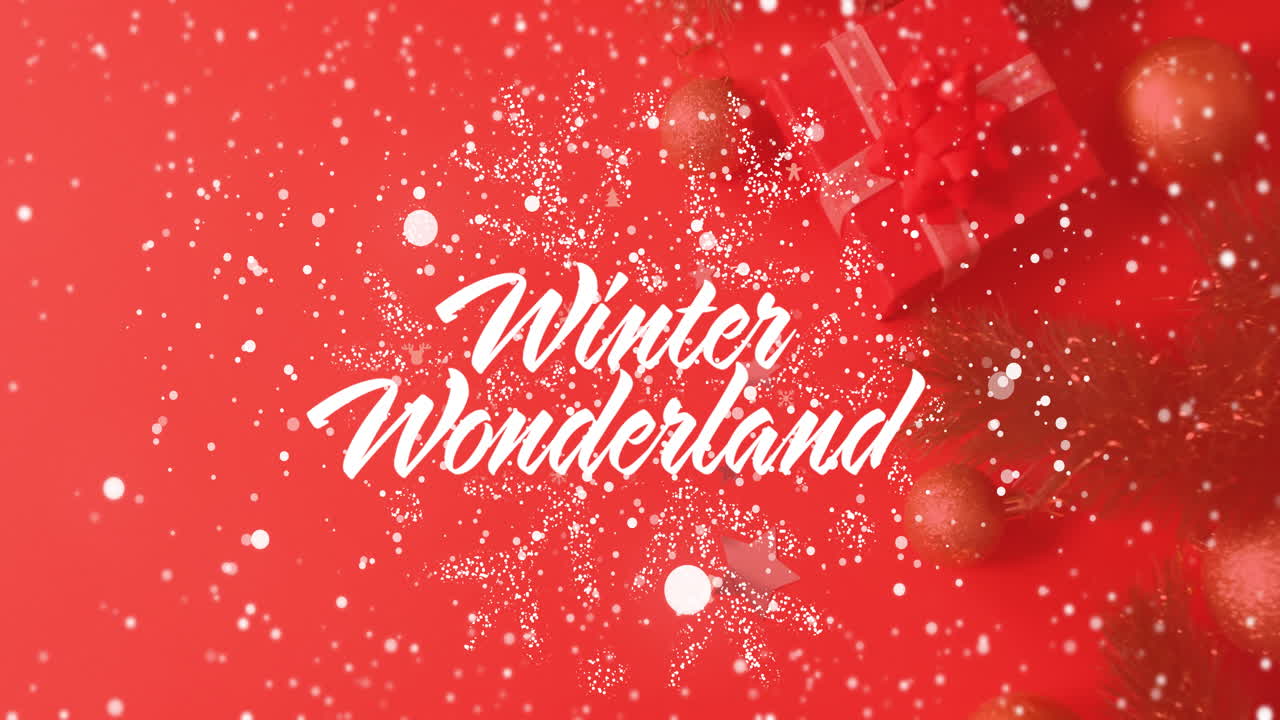 Winter Wonderland text animation over red Christmas decorations and snowflakes