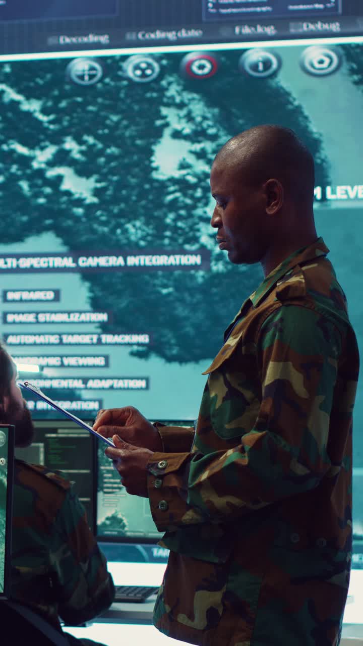 Military Soldier Analyzing Data in High-Tech Operations Center