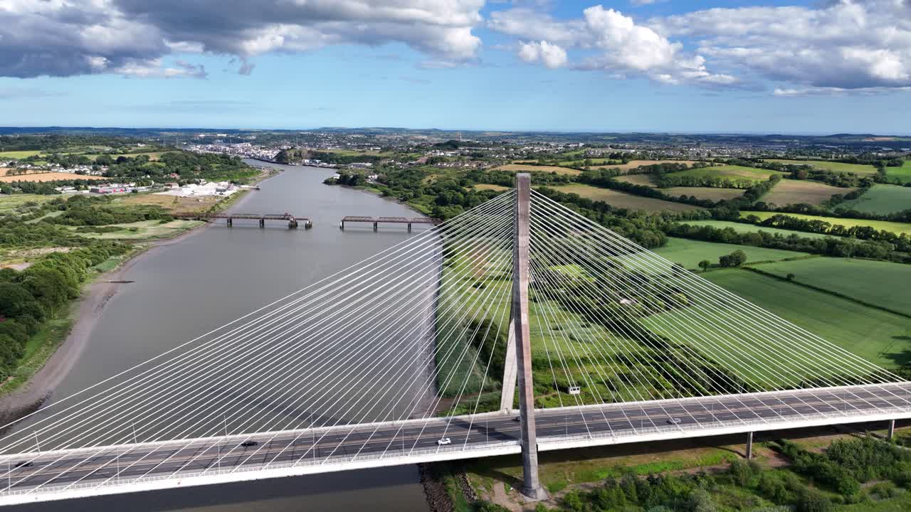 Drone flying over The Thomas Francis Meagher Suspension Bridge with Waterford City and wide River Suir Ireland Epic Locations gateway to the South East