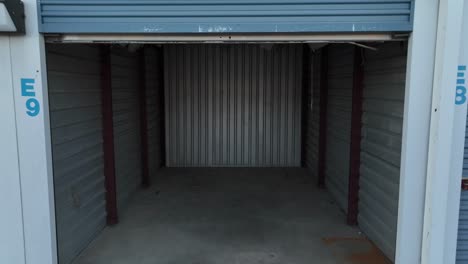 empty storage unit with open garage door