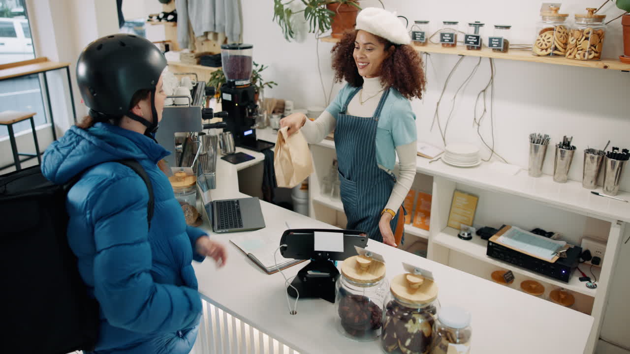 People in a cafe ordering food