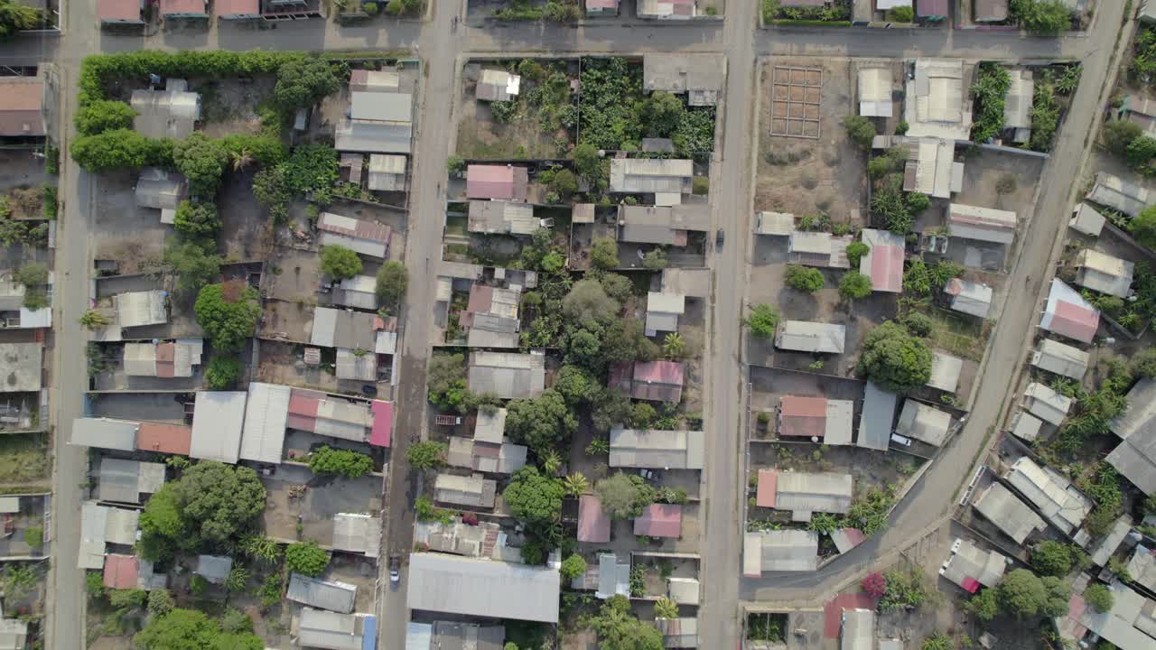 Residential area with rooftops and road in guanarito, portuguesa, venezuela, aerial view