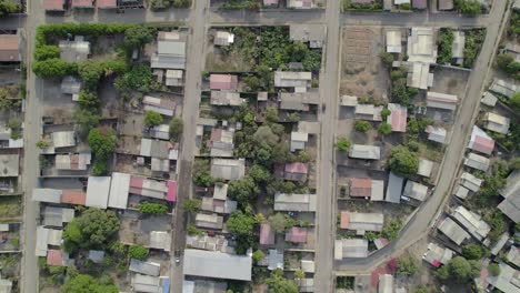 residential area with rooftops and road in guanarito, portuguesa, venezuela, aerial view