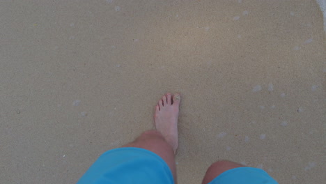 Point-of-view-shot-of-the-male-walking-on-the-beach-at-Koh-Kradan,-Thailand