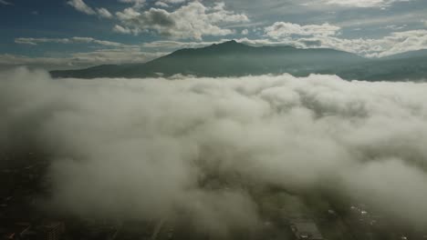 Drone-view-over-Machachi-city-on-a-foggy-sunny-morning