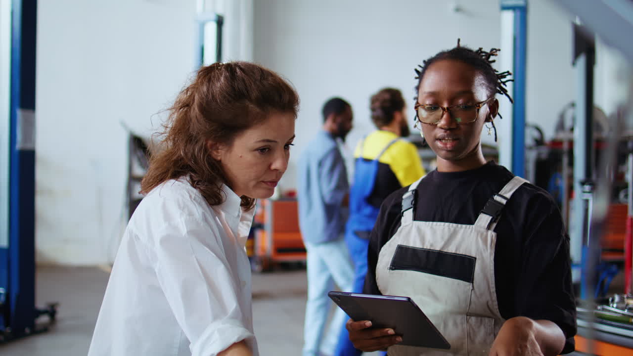 Expert does checkup on client car