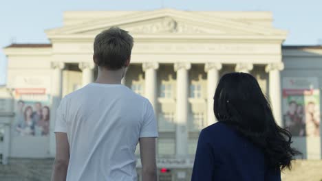 couple looking at a historical building