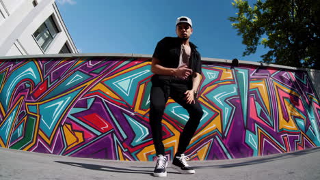 dynamic street dance performance against vibrant graffiti wall